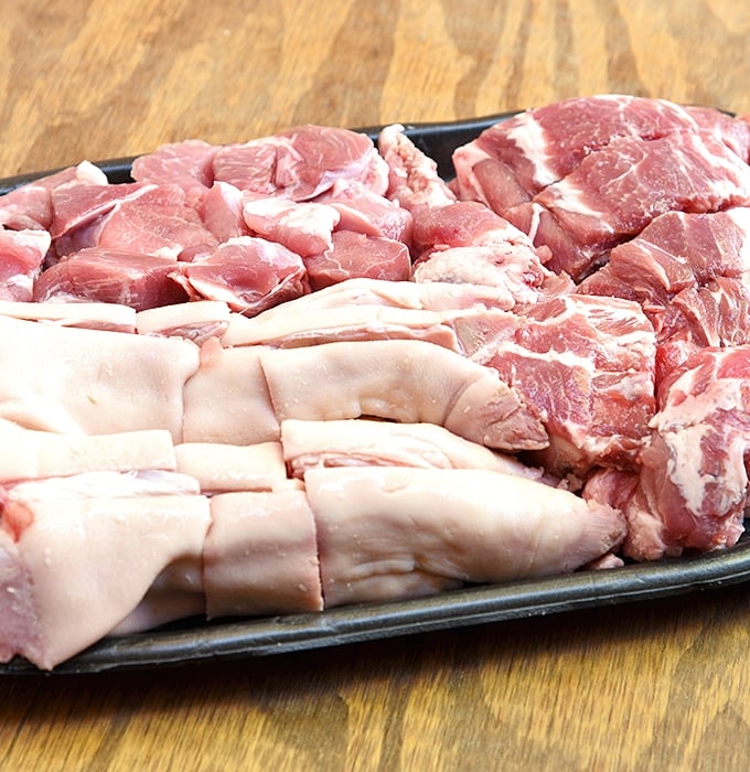 Assemble pork hocks, neck bones, and pork shoulder pieces to make this flavorful pozole.