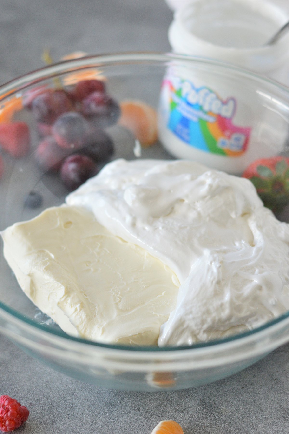 cream cheese and marshmallow creme in a white bowl