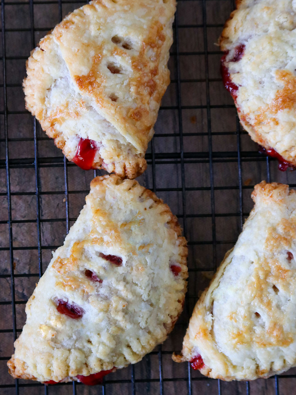cherry hand pies on a wire rack
