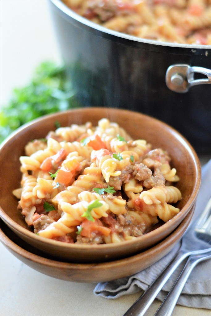 One-Pot Cheeseburger Pasta in a wooden serving bowl