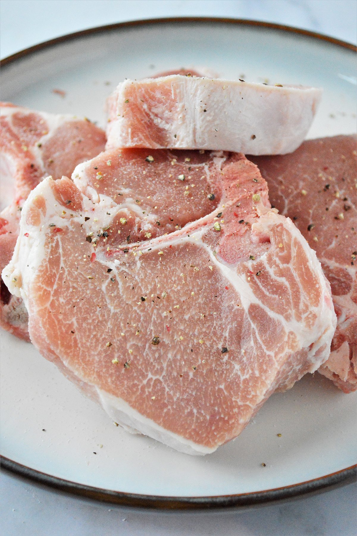 seasoned pork chops on a plate