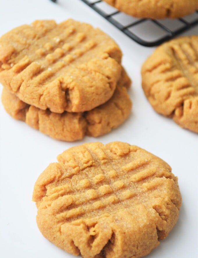 Three-Ingredient Peanut Butter Cookies on a white board.