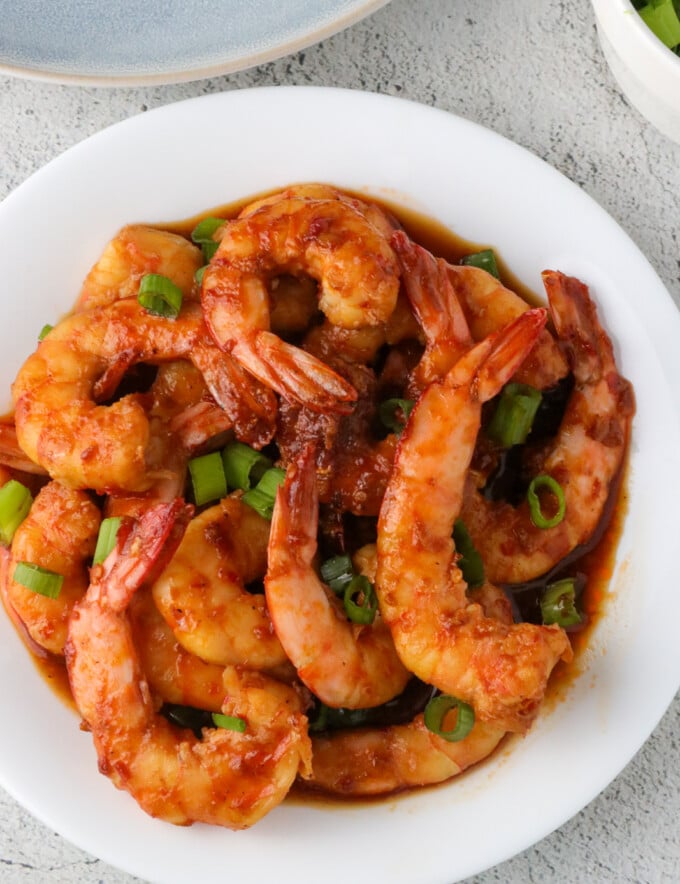 Chili Garlic Shrimp on a white plate.